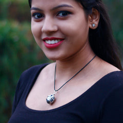 Ayana Wellness hematite necklace evokes Aries energy for January birthdays.