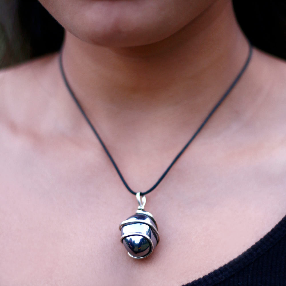 Ayana Wellness hematite necklace promotes root chakra balance during daily routines.