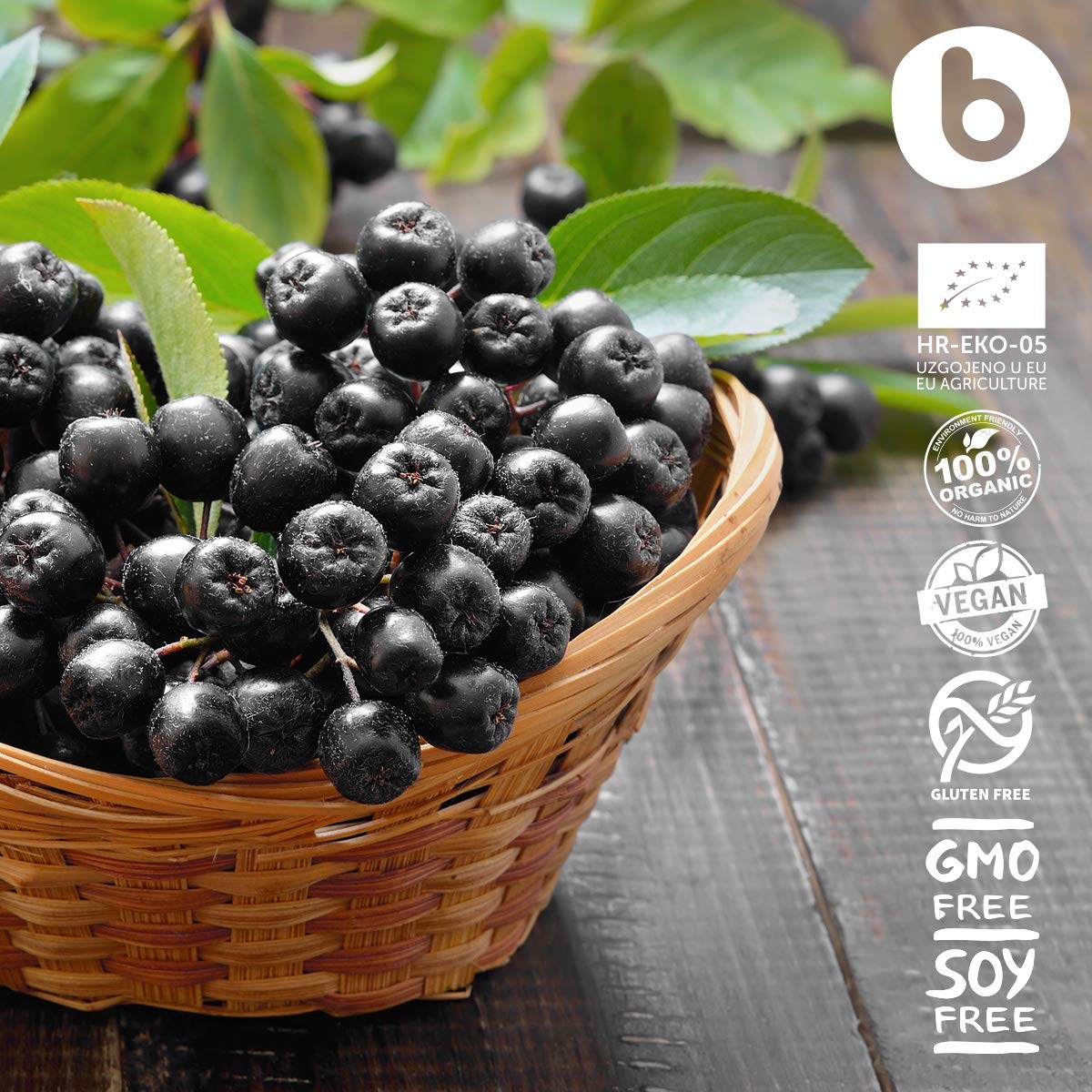 Brand b Organic Aronia Berry Capsules vegan GMP badge on packaging.