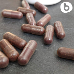 Brand b Organic Aronia Berry Capsules bottle with GMP-compliant label.