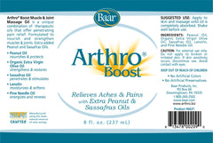 Close-up of label highlights organic extra virgin olive oil base for skin nourishment.