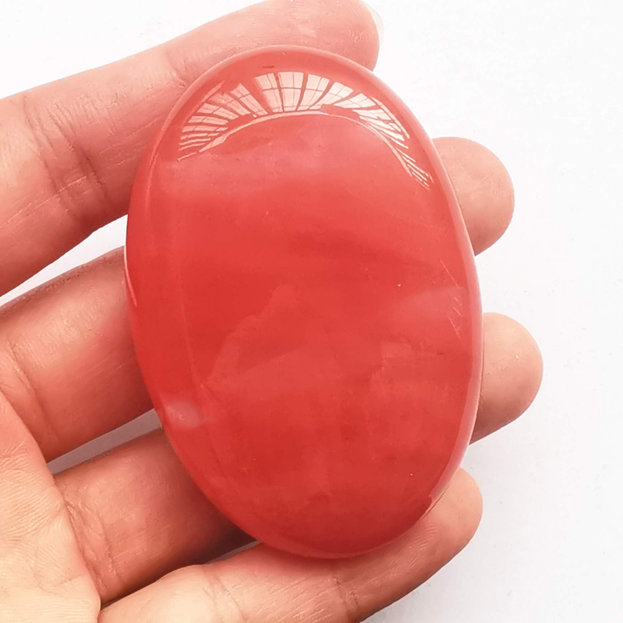 Bacatgem Cherry Quartz close-up showing smooth surface ideal for massage and stress relief