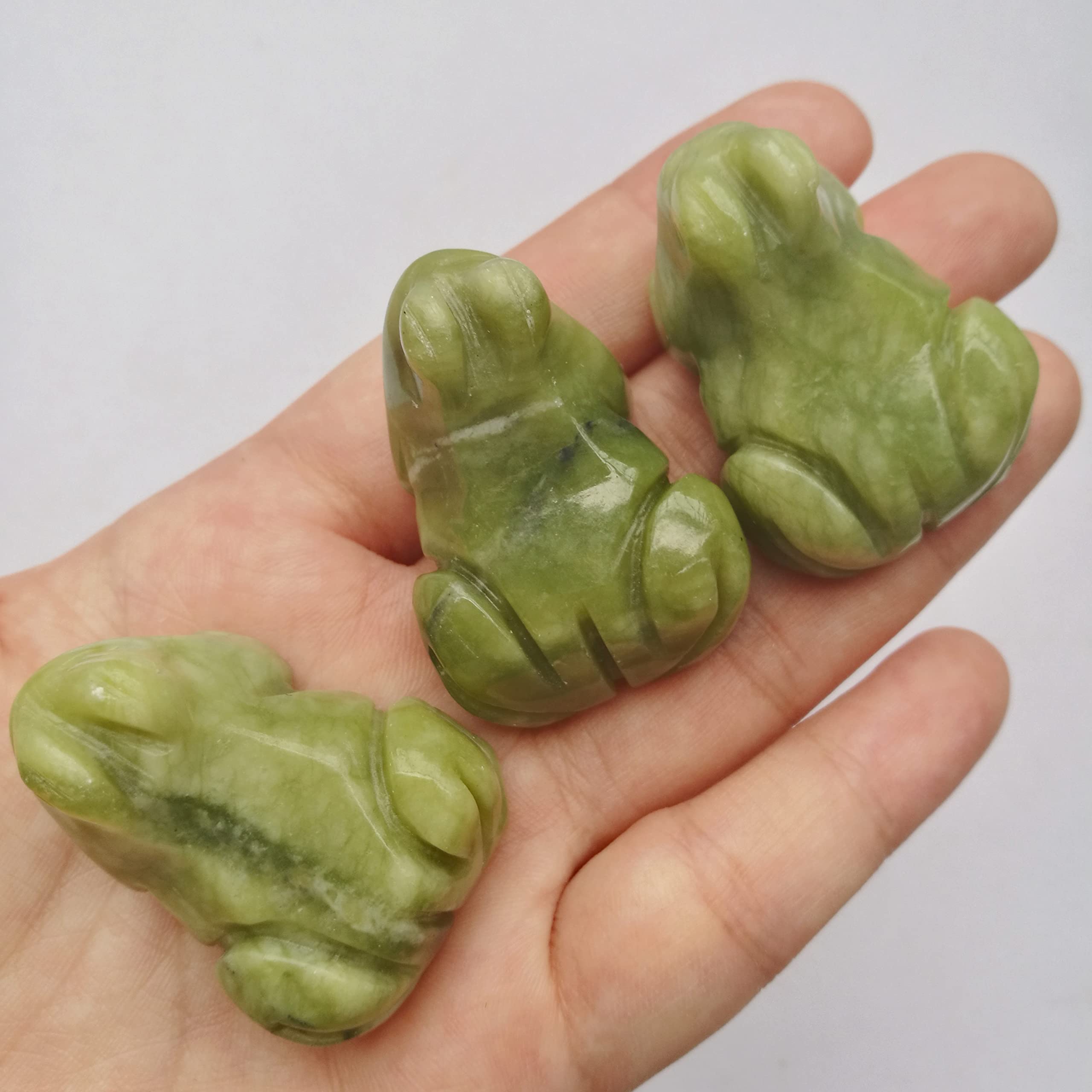 Bacatgem green jade frog figurine closeup highlighting natural texture and healing vibes.