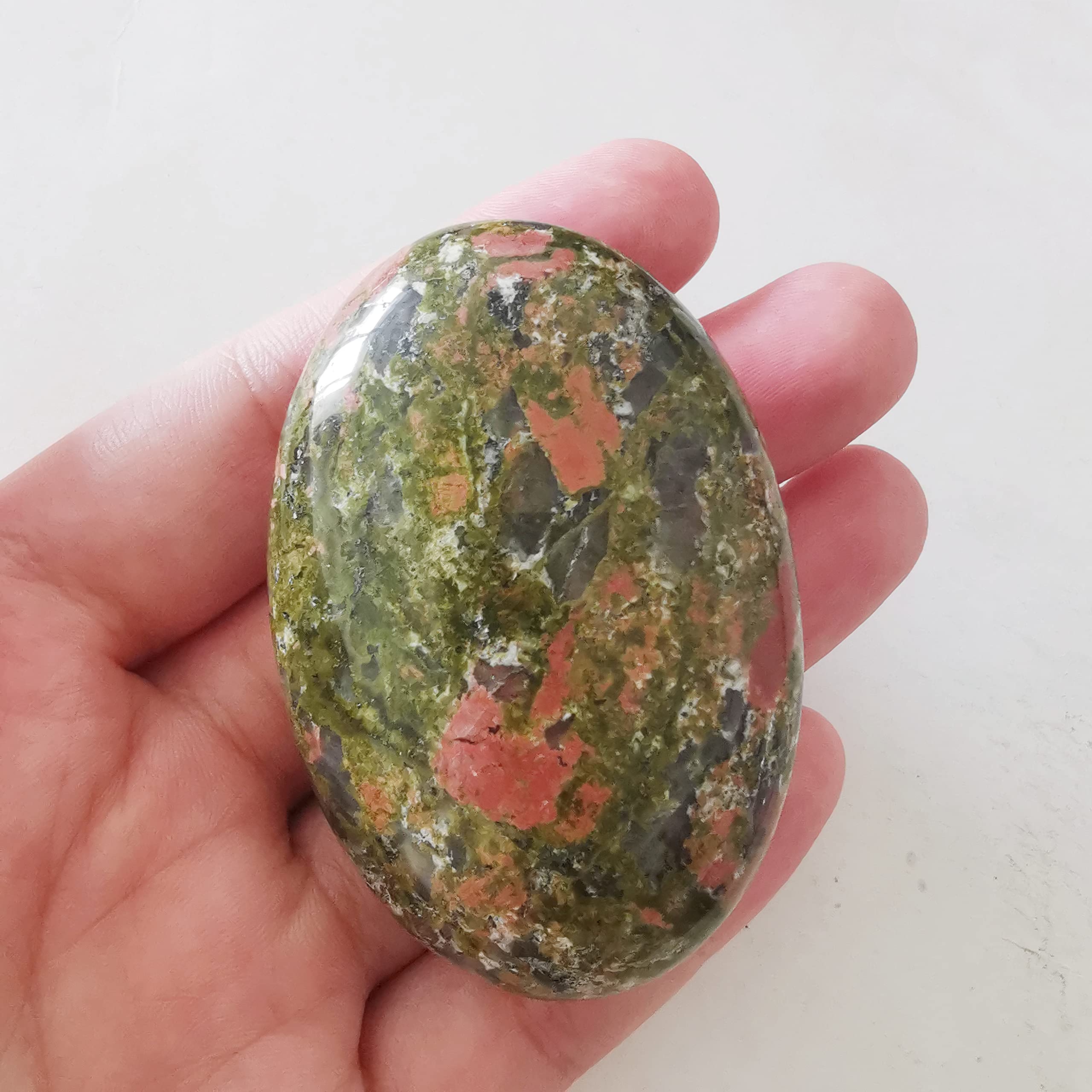 Bacatgem handheld worry stone in natural texture ready for relaxation and balance.