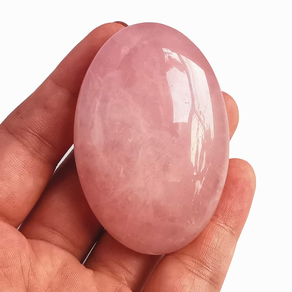 Bacatgem rose quartz oval palm massage stone for relaxing touch and mindful stress relief.