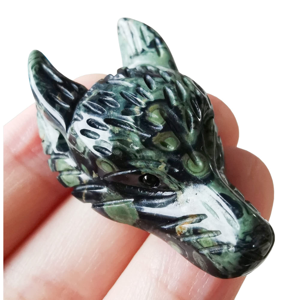 Bacatgem wolf head figurine close-up, kambaba jasper for meditation and focus.