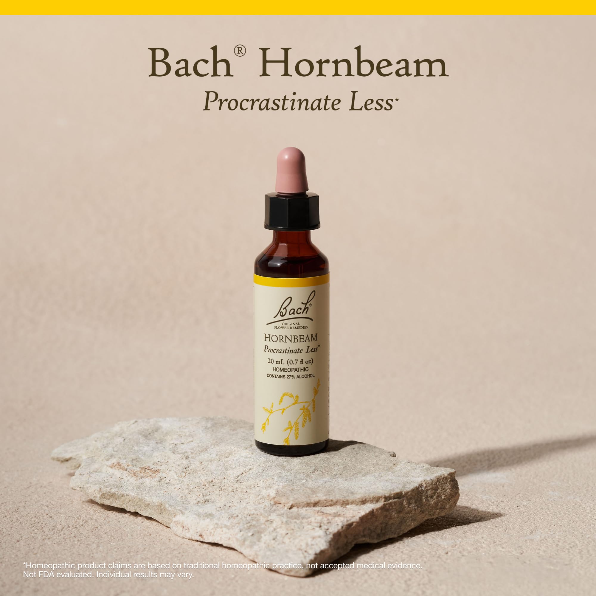 Bach Hornbeam bottle beside a notebook for focus during tasks.