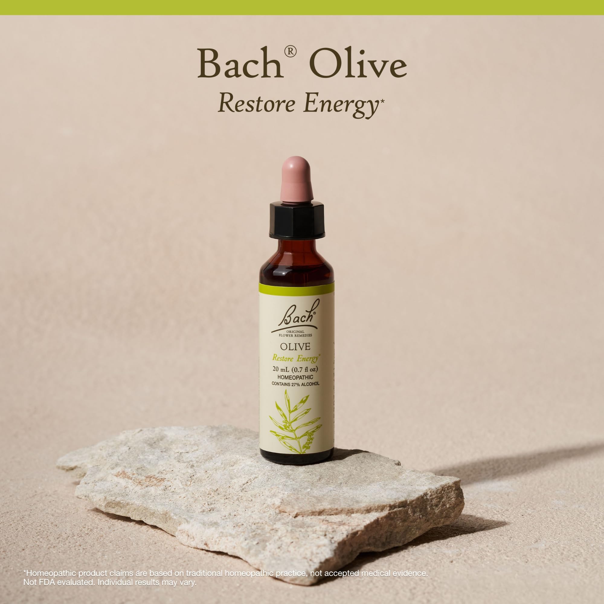Bach Olive bottle pouring drops into water for easy use.