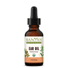 Banyan Botanicals Ear Oil with amber bottle close-up showing packaging and calm mood