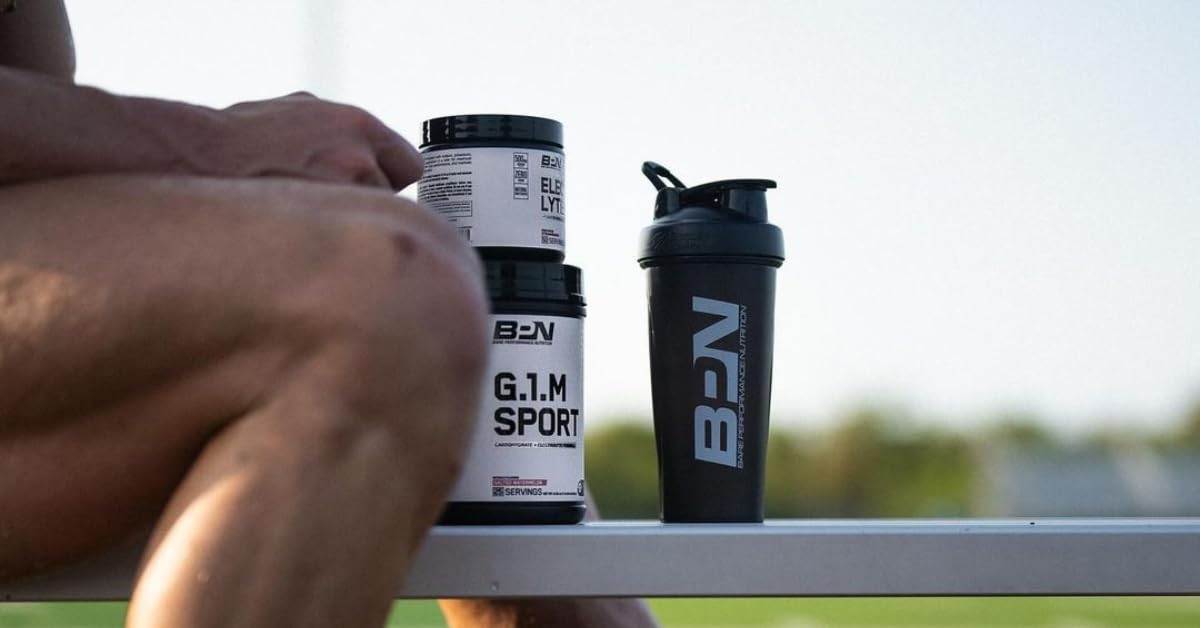 BARE PERFORMANCE NUTRITION product on shelf with electrolytes and gear