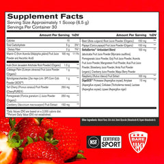Bare Performance Nutrition Strong Reds scoop blending into liquid for energy.