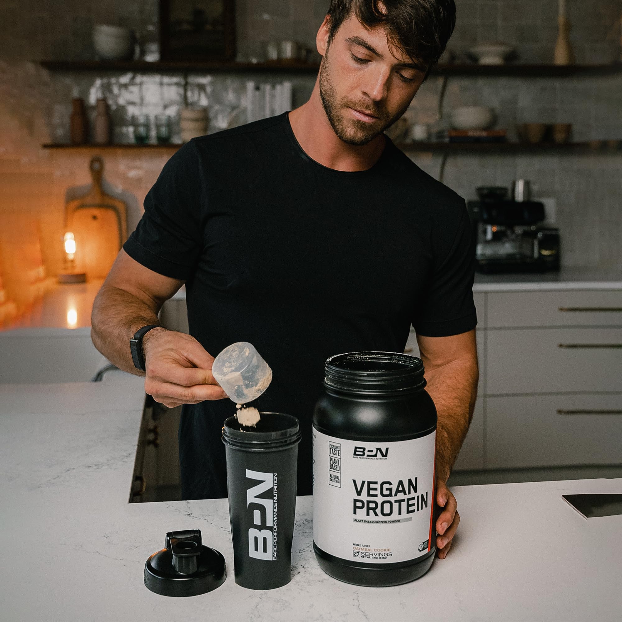 Glass of chocolate vegan protein shake ready to sip