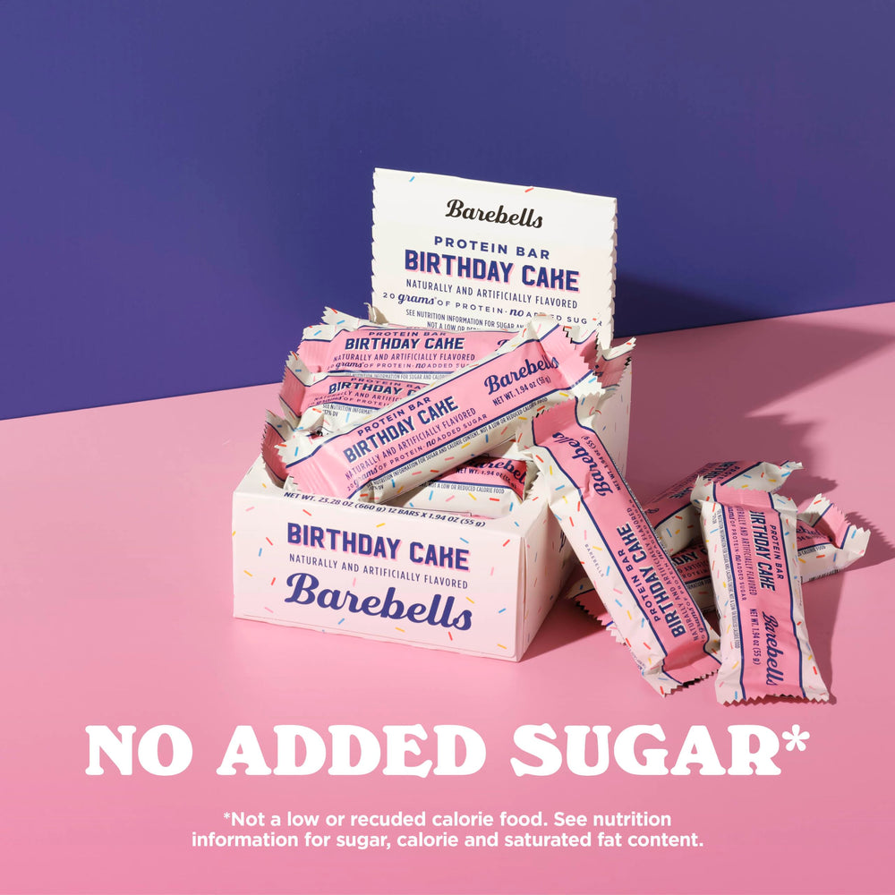 Barebells Birthday Cake cross-section reveals soft texture and frosting-like flavor.