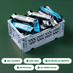 Barebells Cookies and Cream bar close-up highlighting cookie flavor and protein boost.