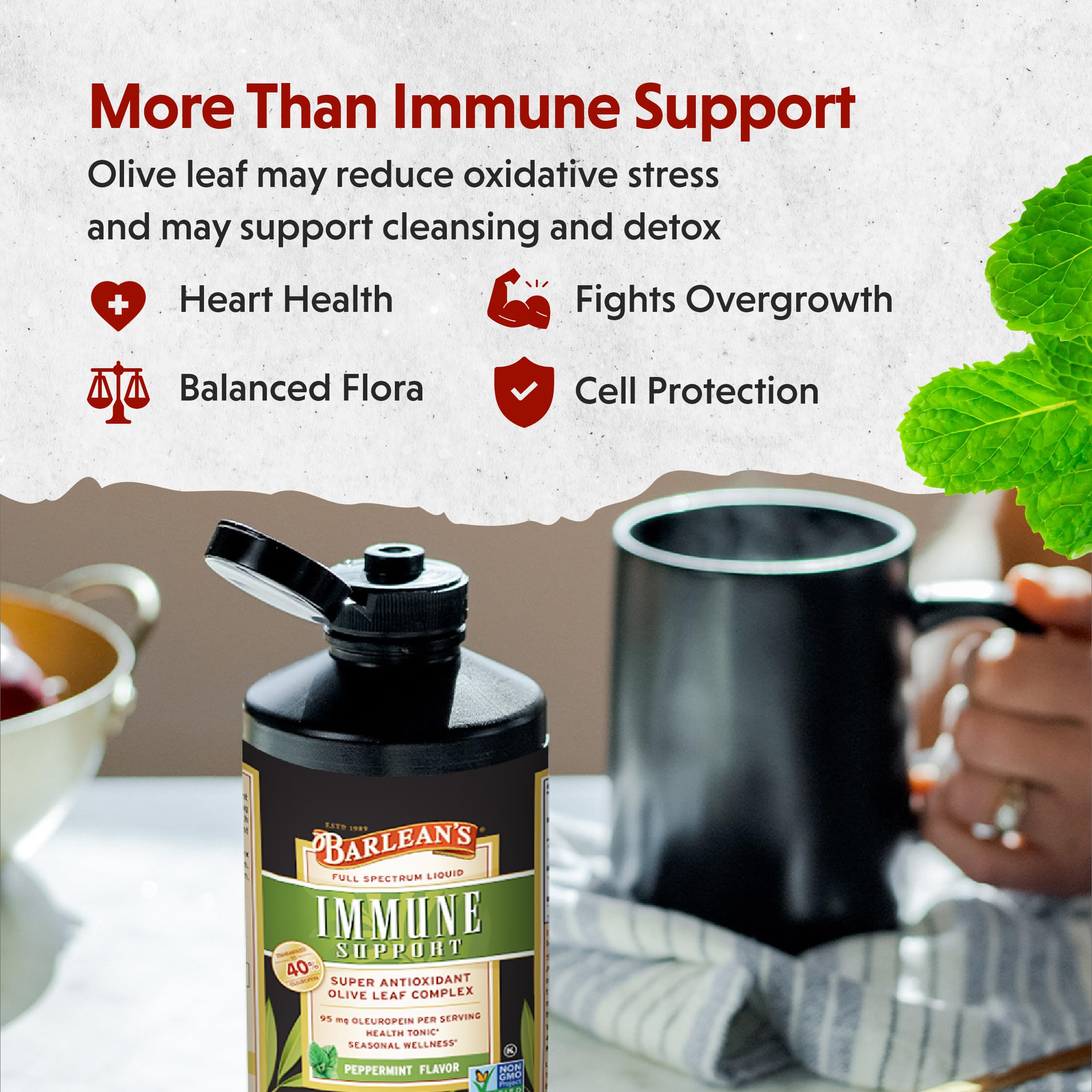 Measuring spoon serving of Barlean's Peppermint Olive Leaf Complex for tea.