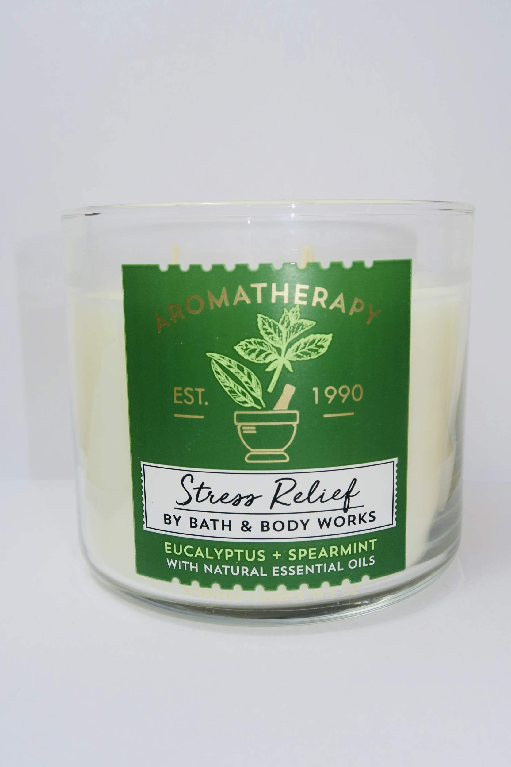 Bath and Body Works Aromatherapy Stress Relief candle with eucalyptus spearmint flame creates relaxing atmosphere.