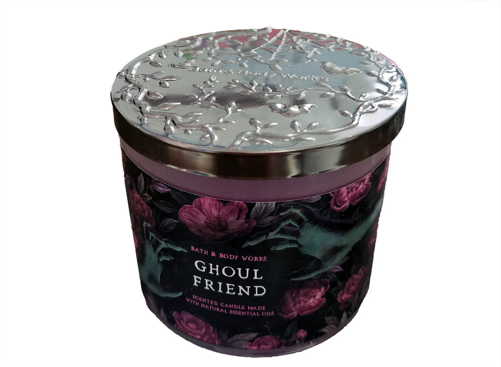 Bath & Body Works Ghoul Friend candle packaging showcases festive design for display.