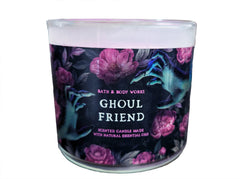 Bath & Body Works Ghoul Friend candle wax texture glows softly on a cozy table.