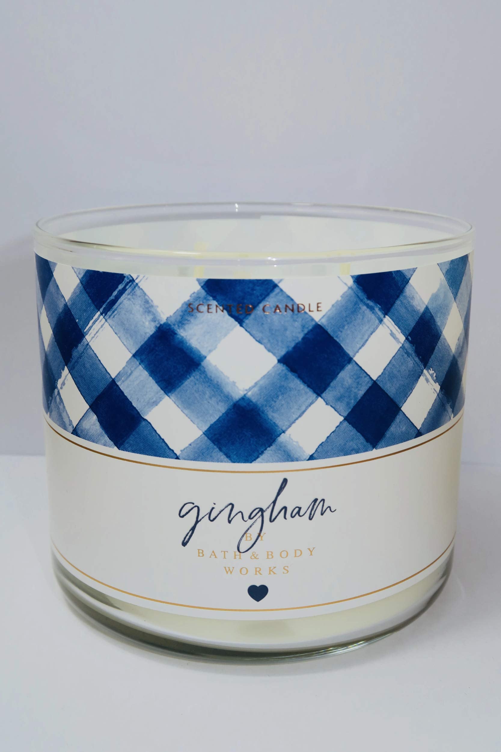 Bath & Body Works Gingham 3-Wick Candle flame close-up for cozy ambience.