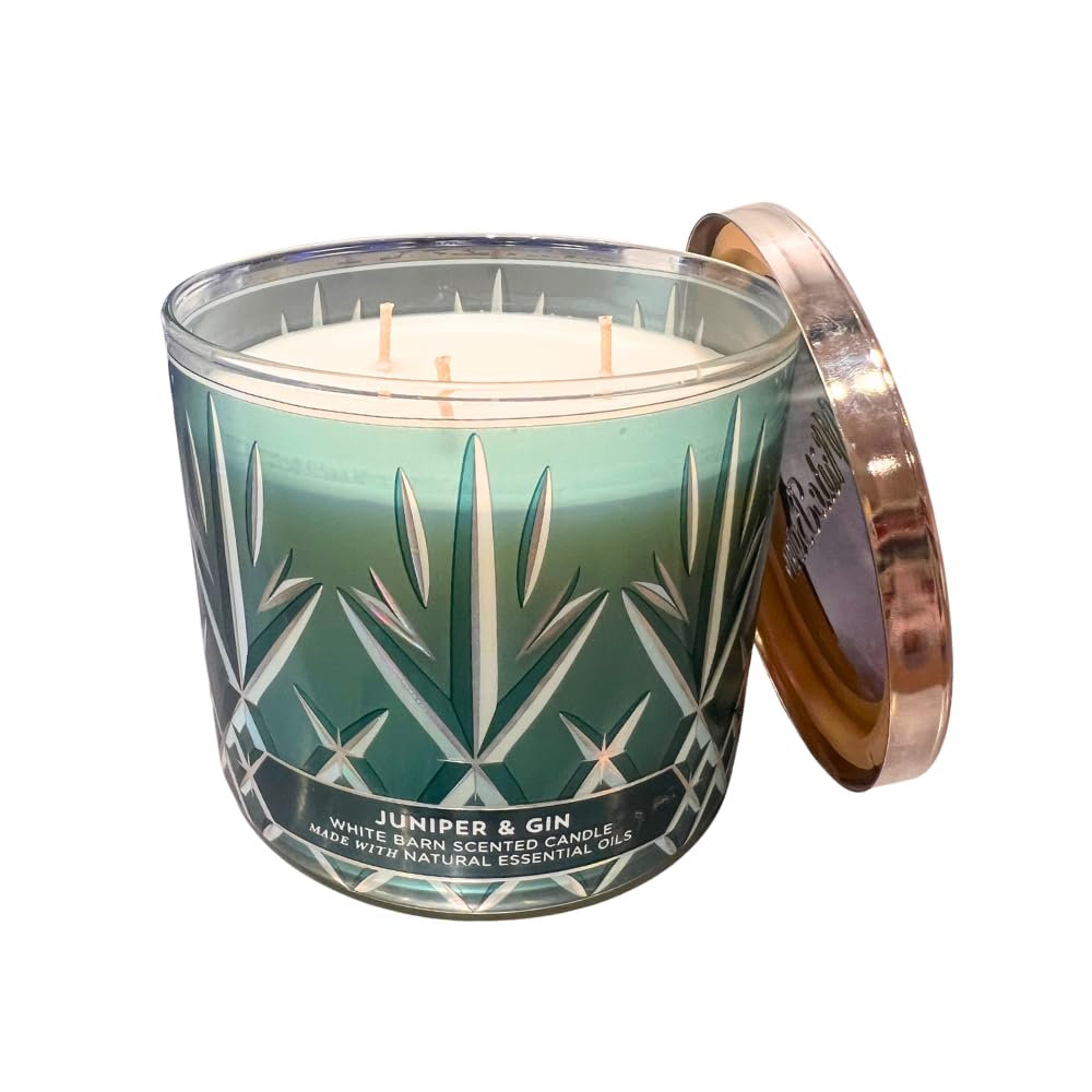 Bath and Body Works Juniper and Gin candle burning with soft glow for cozy evenings.