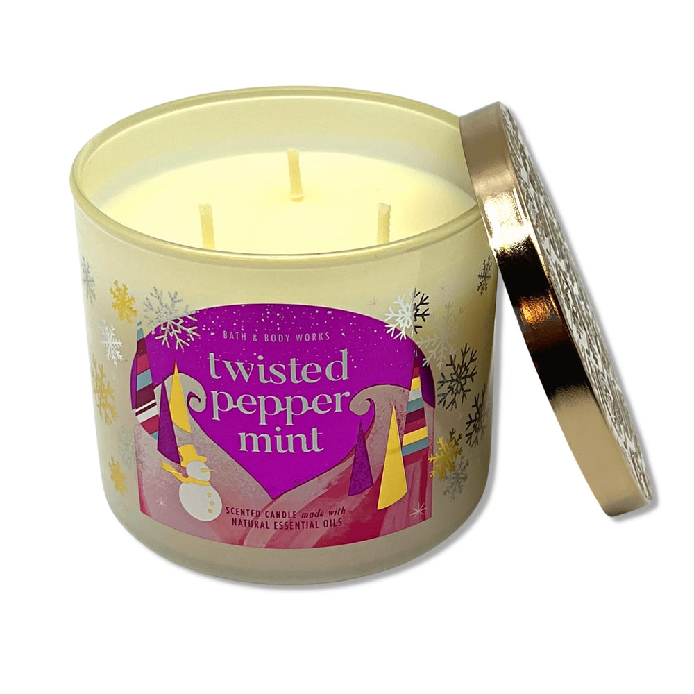 Bath & Body Works Twisted Peppermint candle decorative lid adds holiday charm.