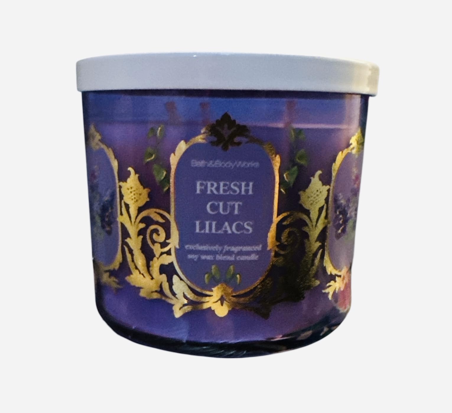 Bath & Body Works White Barn 3-Wick Candle jar offers warm spring ambiance.