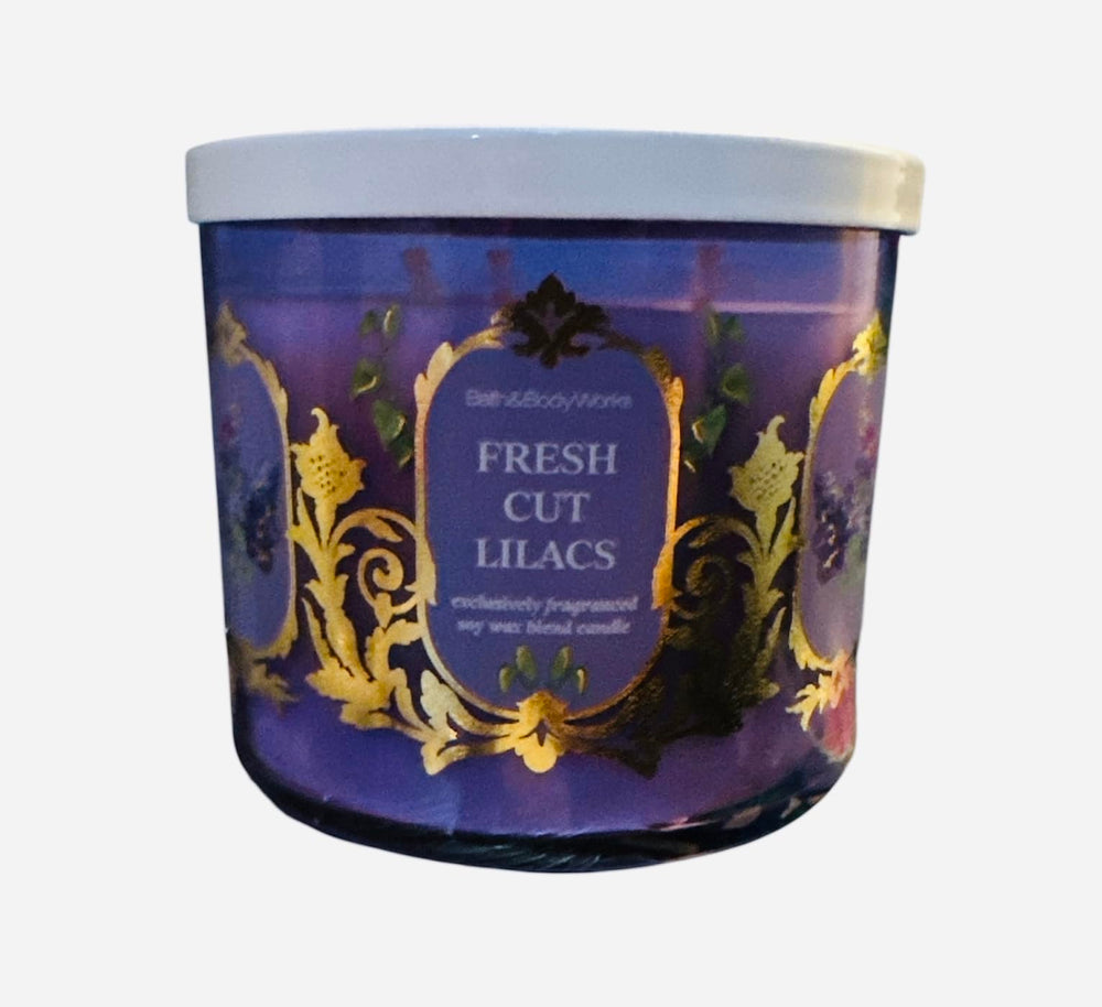 Bath & Body Works White Barn 3-Wick Candle jar offers warm spring ambiance.