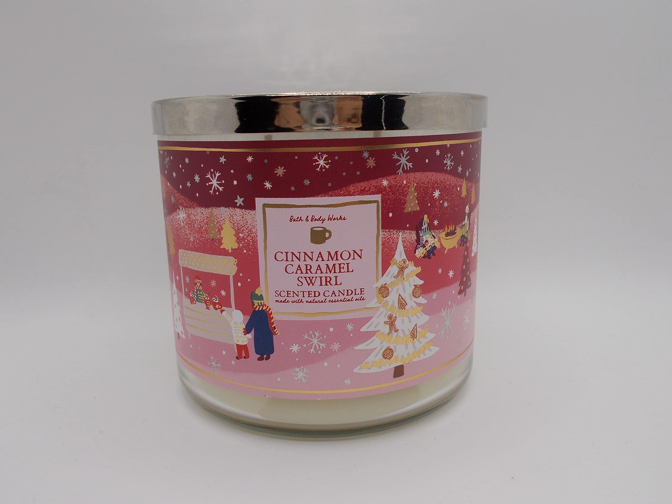 Seasonal artwork variation on White Barn candle with cinnamon caramel aroma.