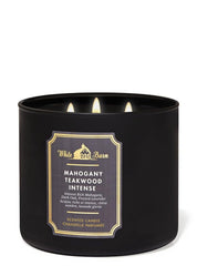 Bath & Body Works White Barn candle in elegant jar design enhances decor with warm lighting