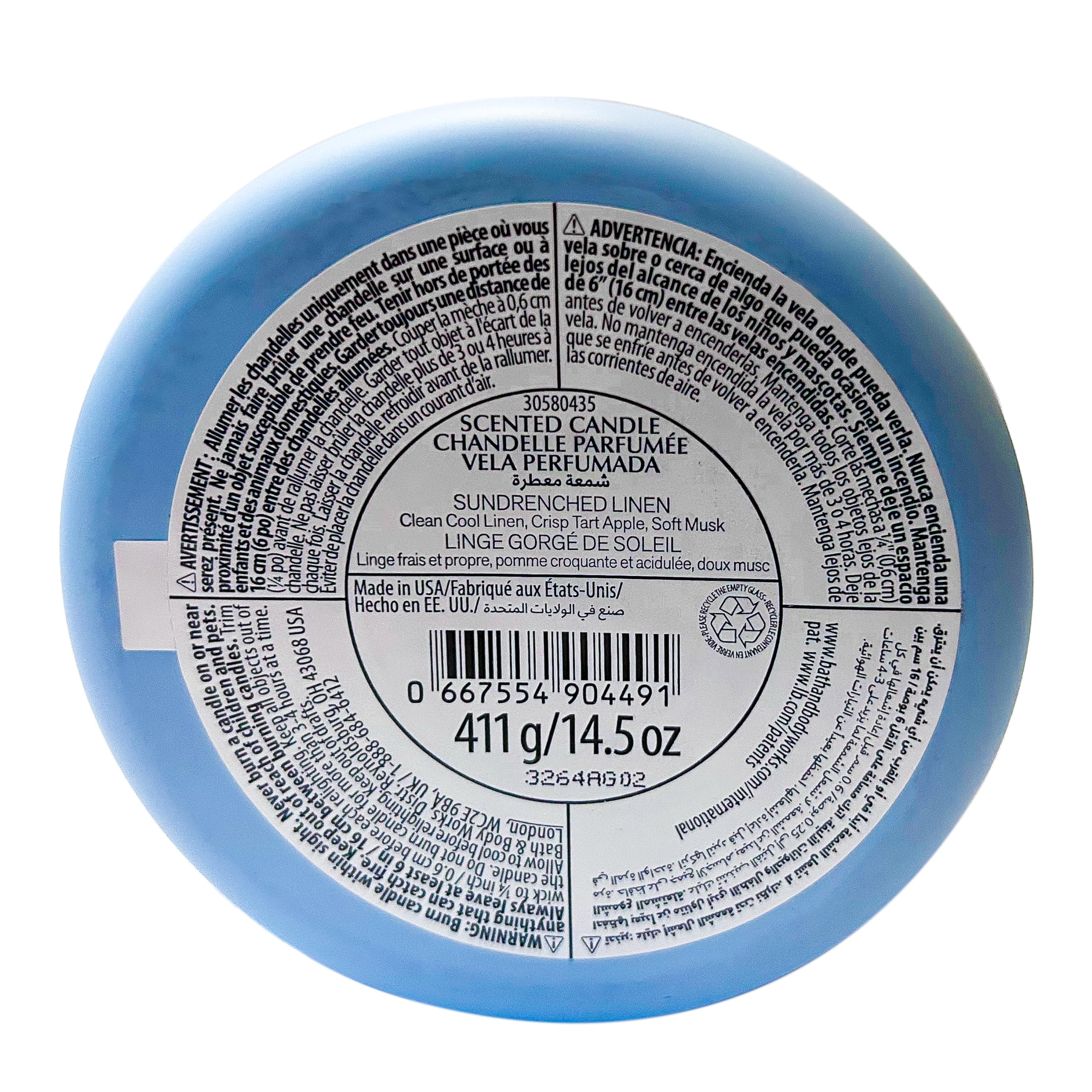 Three-wick Sundrenched Linen candle burning evenly for a cozy scent throw.