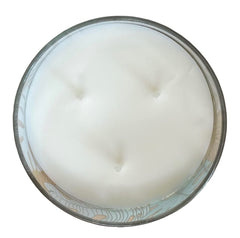 Bath & Body Works White Barn Warm Ocean Breeze candle embossed glass with seasonal refreshment look.