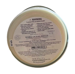 Bath & Body Works White Barn Warm Ocean Breeze candle wick close-up for clean burn aesthetics.