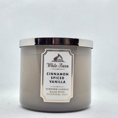 Bath & Body Works Cinnamon Spiced Vanilla candle with 3-Wick setup for a cozy living room ambiance.