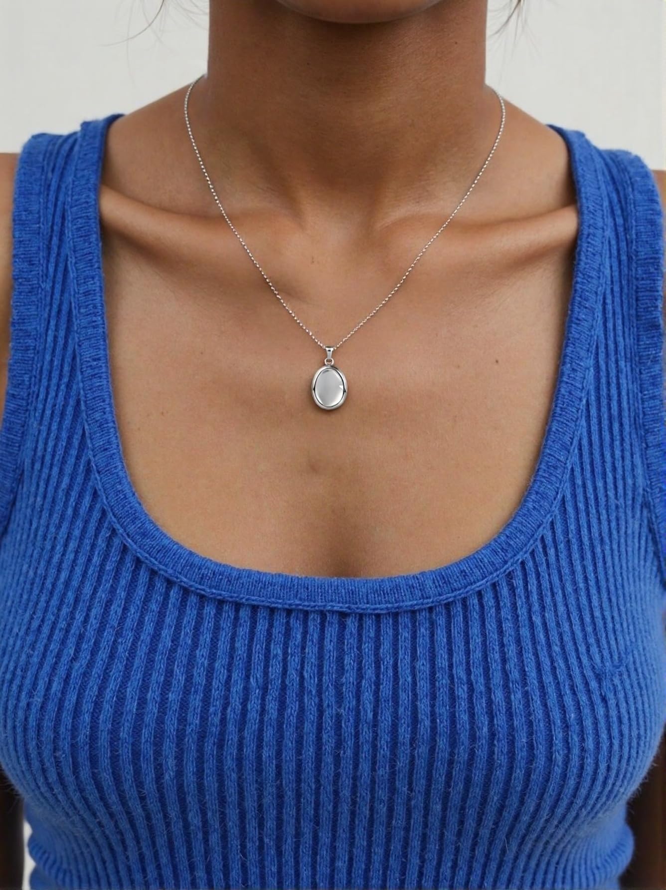 BBPM worry stone necklace detail shot showing engraved texture