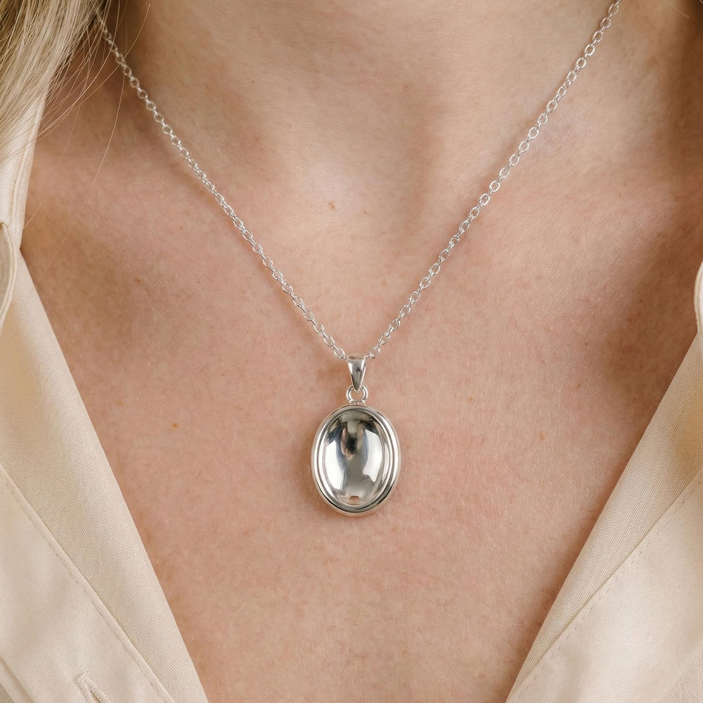 BBPM worry stone necklace styled with outfit, day-to-night jewelry