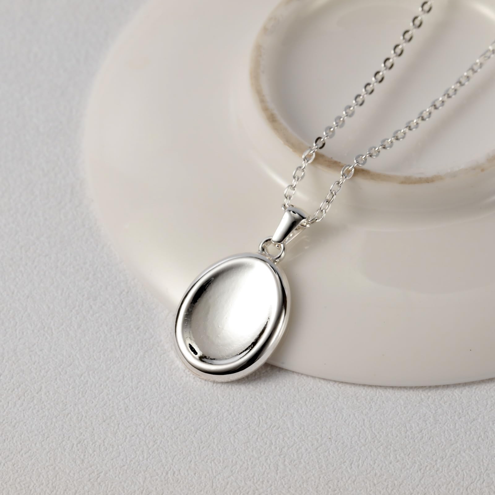 BBPM worry stone necklace worn silver with chain, versatile style for meditation and focus