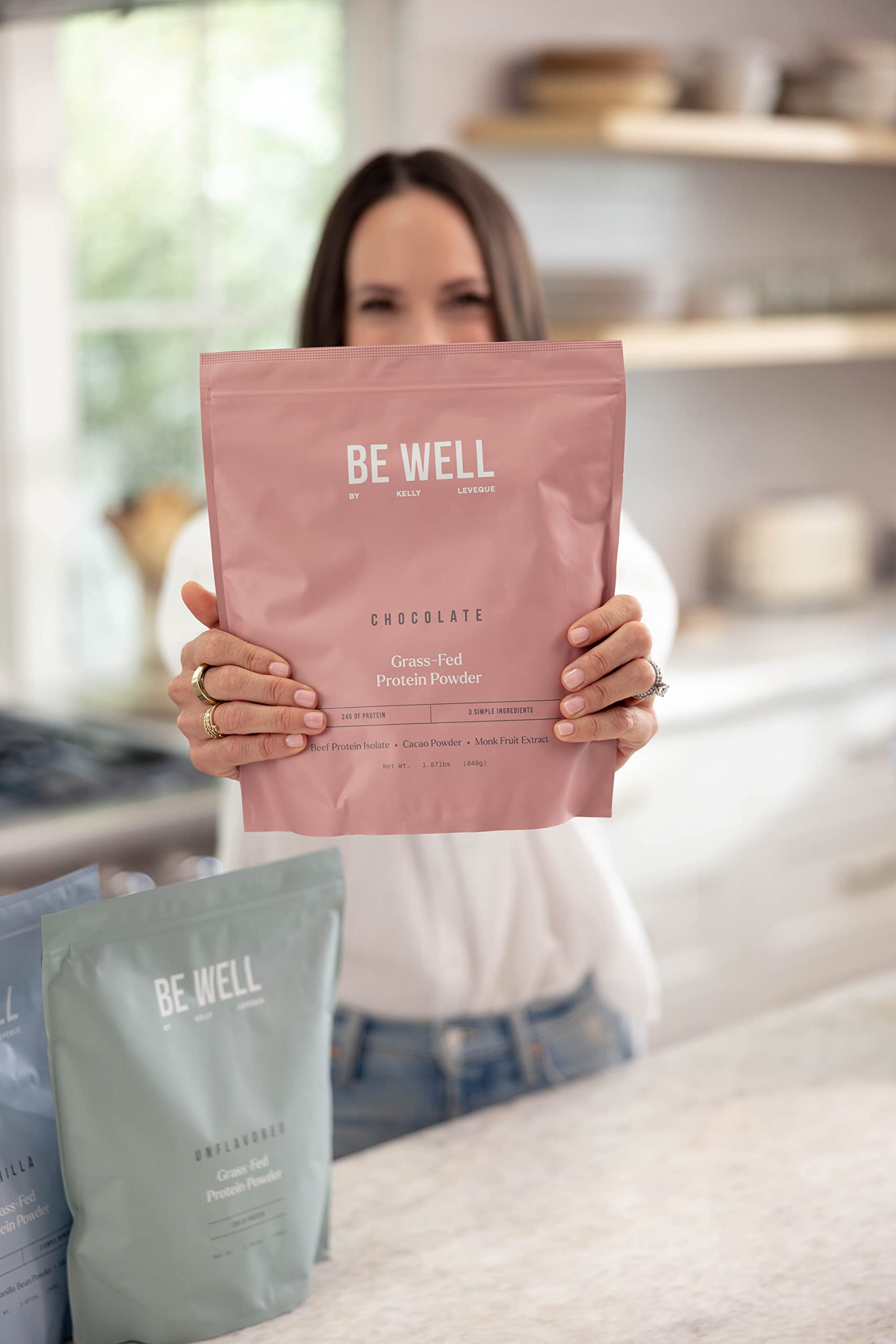 Be Well by Kelly chocolate beef protein powder mixed with milk for a creamy shake