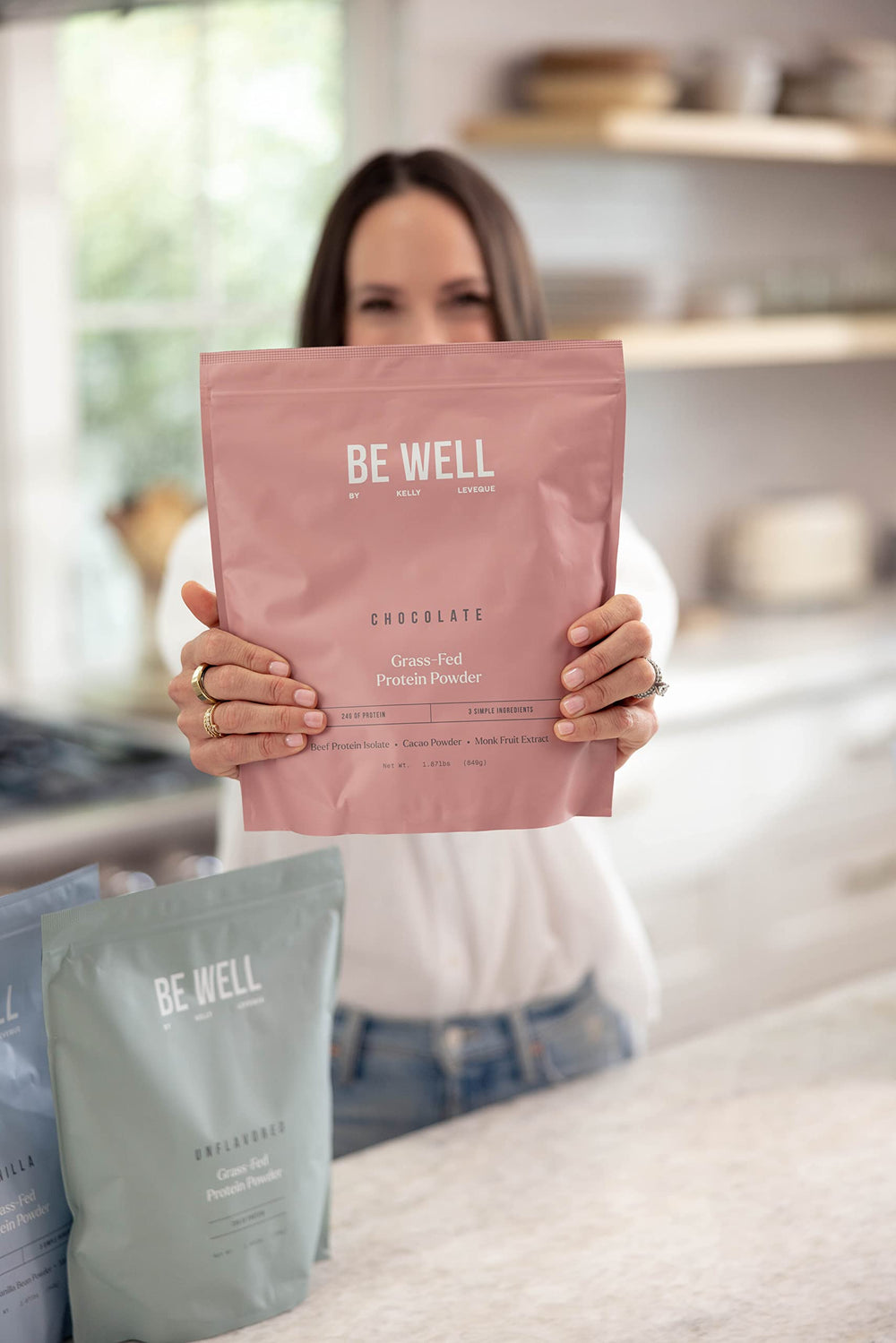 Be Well by Kelly chocolate beef protein powder mixed with milk for a creamy shake