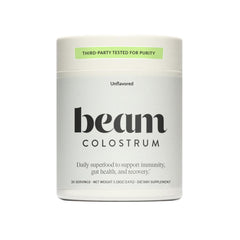 Beam Colostrum Powder 3g serving scoop may support immune health and digestive comfort.