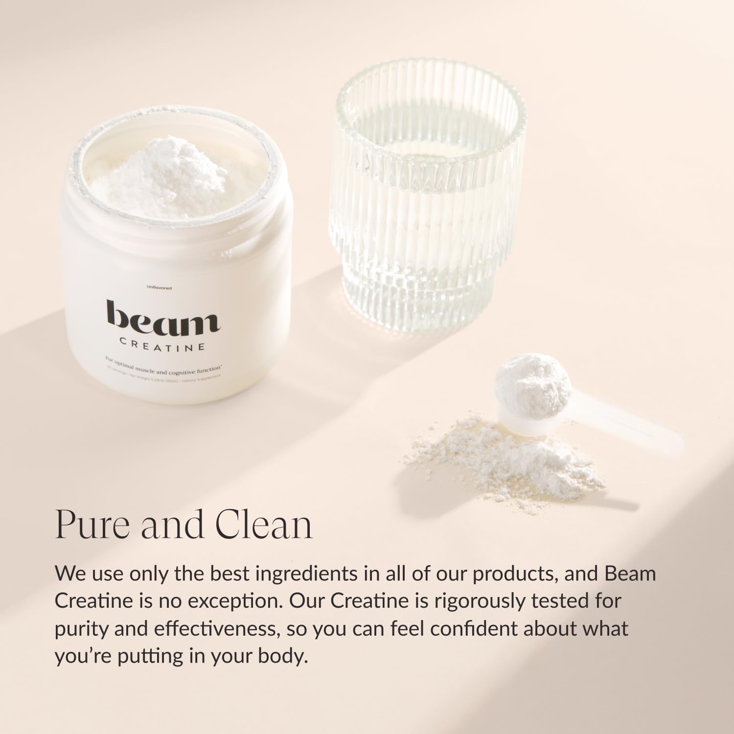 Beam Creatine Powder scoop pouring powder into shaker for quick pre-workout use.