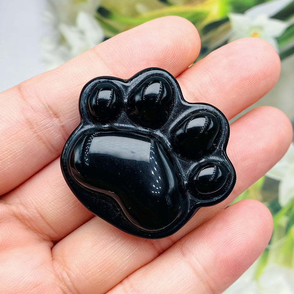 BEAUSIOO Obsidian animal paw worry stone polished surface showing hand-polished shine aiding tactile relaxation