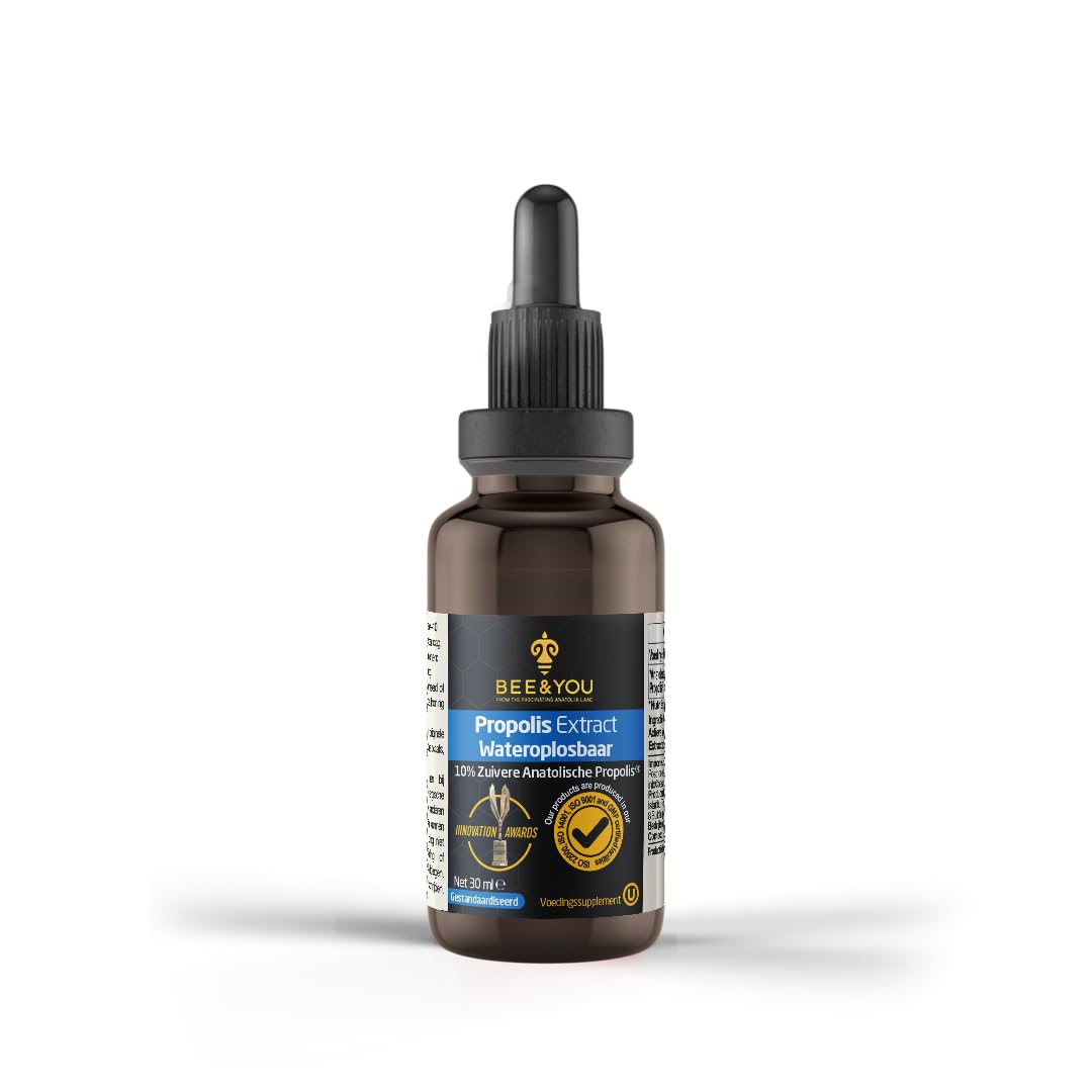 Bee & You propolis drops being added to a glass of water