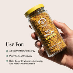 Beekeeper's Naturals bee pollen granules pouring into spoon for quick nutrient boost.
