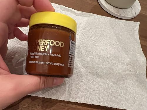 Beekeeper's Naturals Superfood Honey drip over tea without caffeine