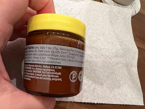 Beekeeper's Naturals Superfood Honey ingredients spread with propolis and pollen