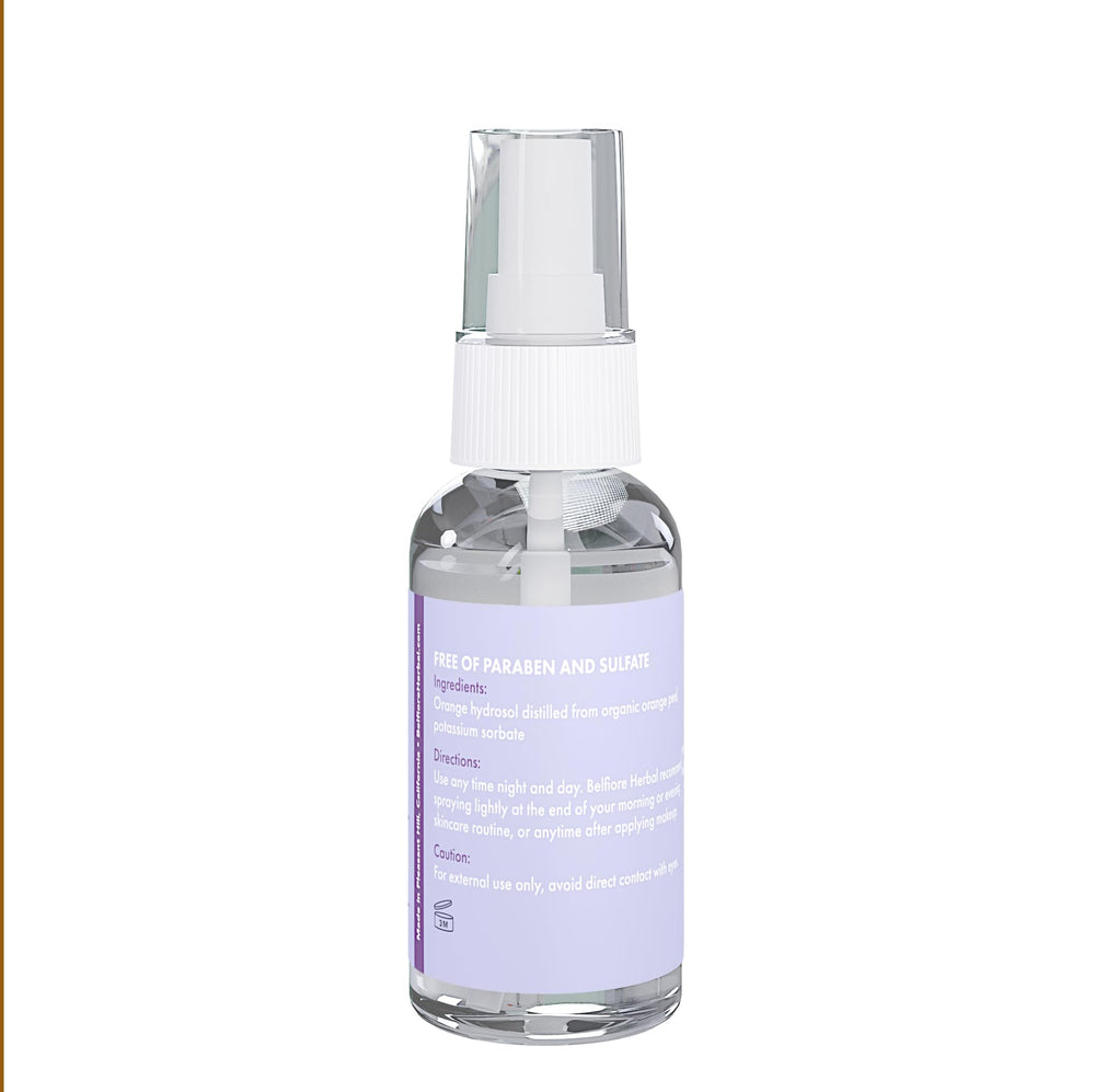 Belfiore Herbal Vitamin C Mist Set mist spray dispersing evenly on skin.