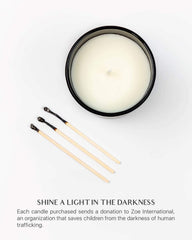 Benevolence LA candle in black jar with lid for a gift-ready look.