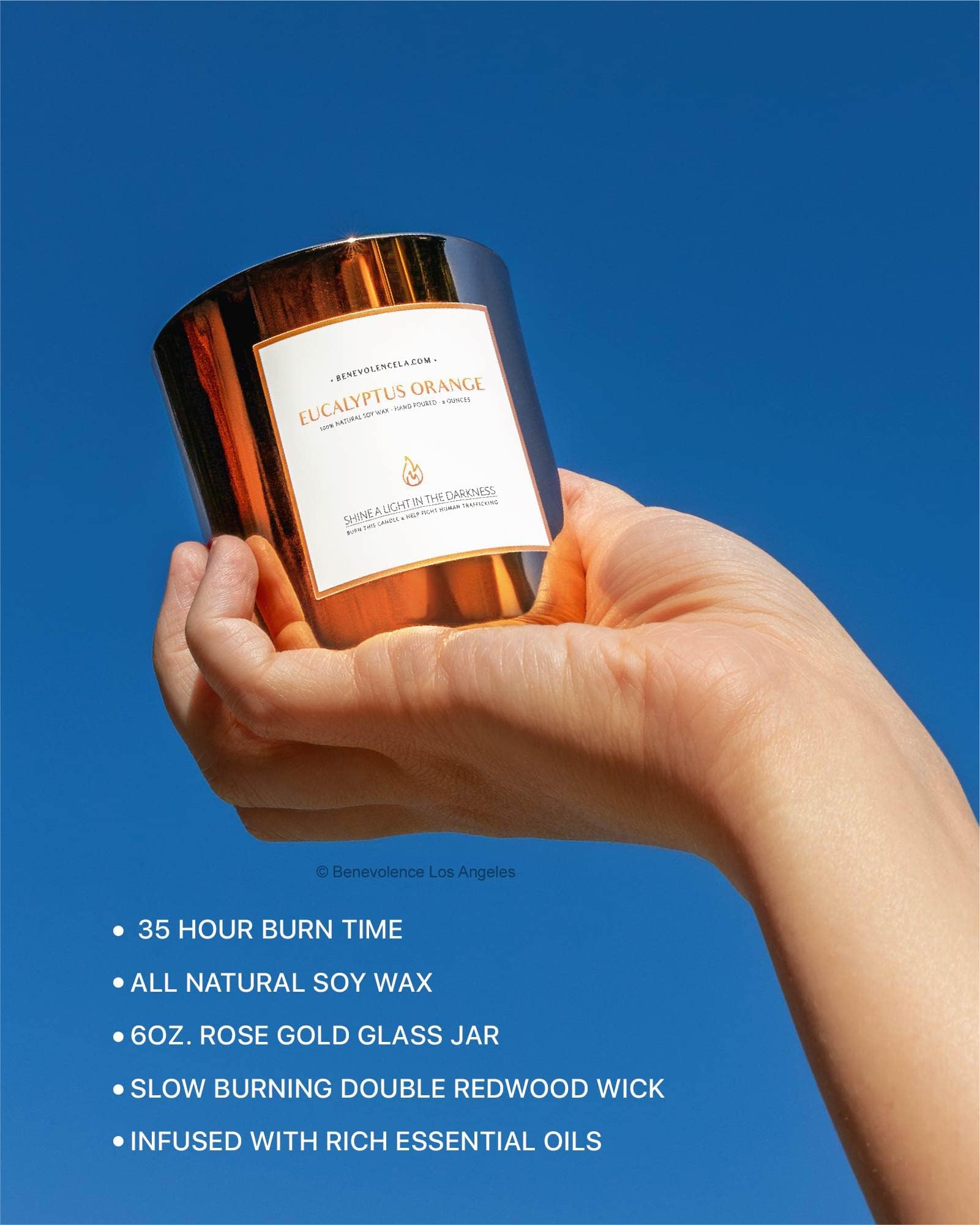 Benevolence LA holiday aromatherapy candle eucalyptus orange 8oz uplifts mood and promotes relaxation