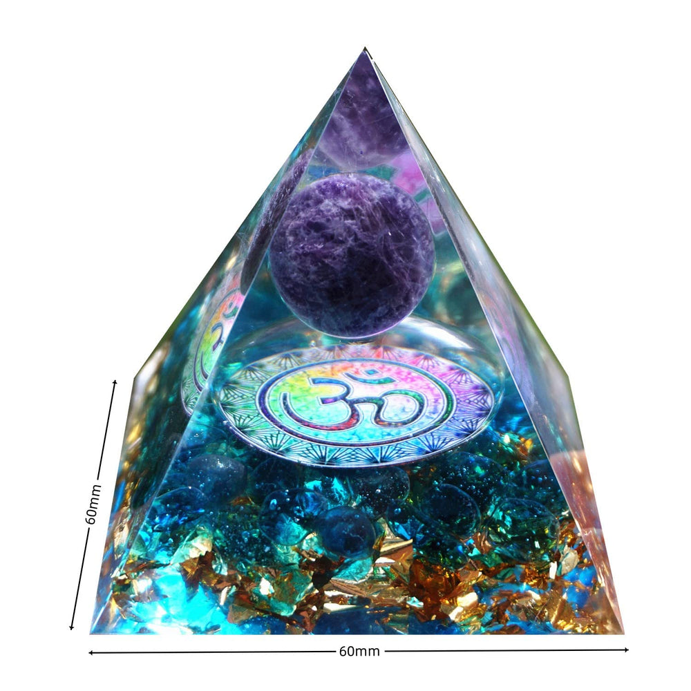 Besorgone orgonite pyramid with blue quartz stones in decorative setup