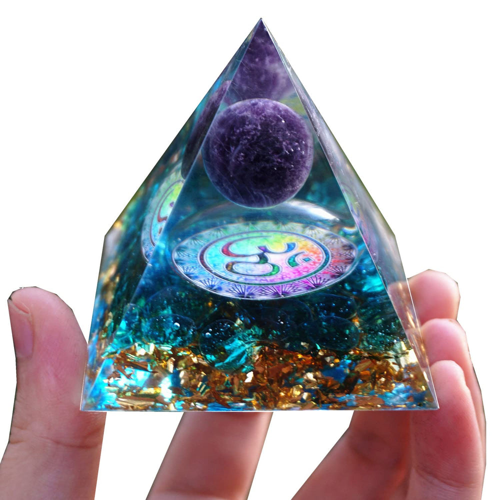Besorgone orgonite pyramid on a work desk for ambient energy balance